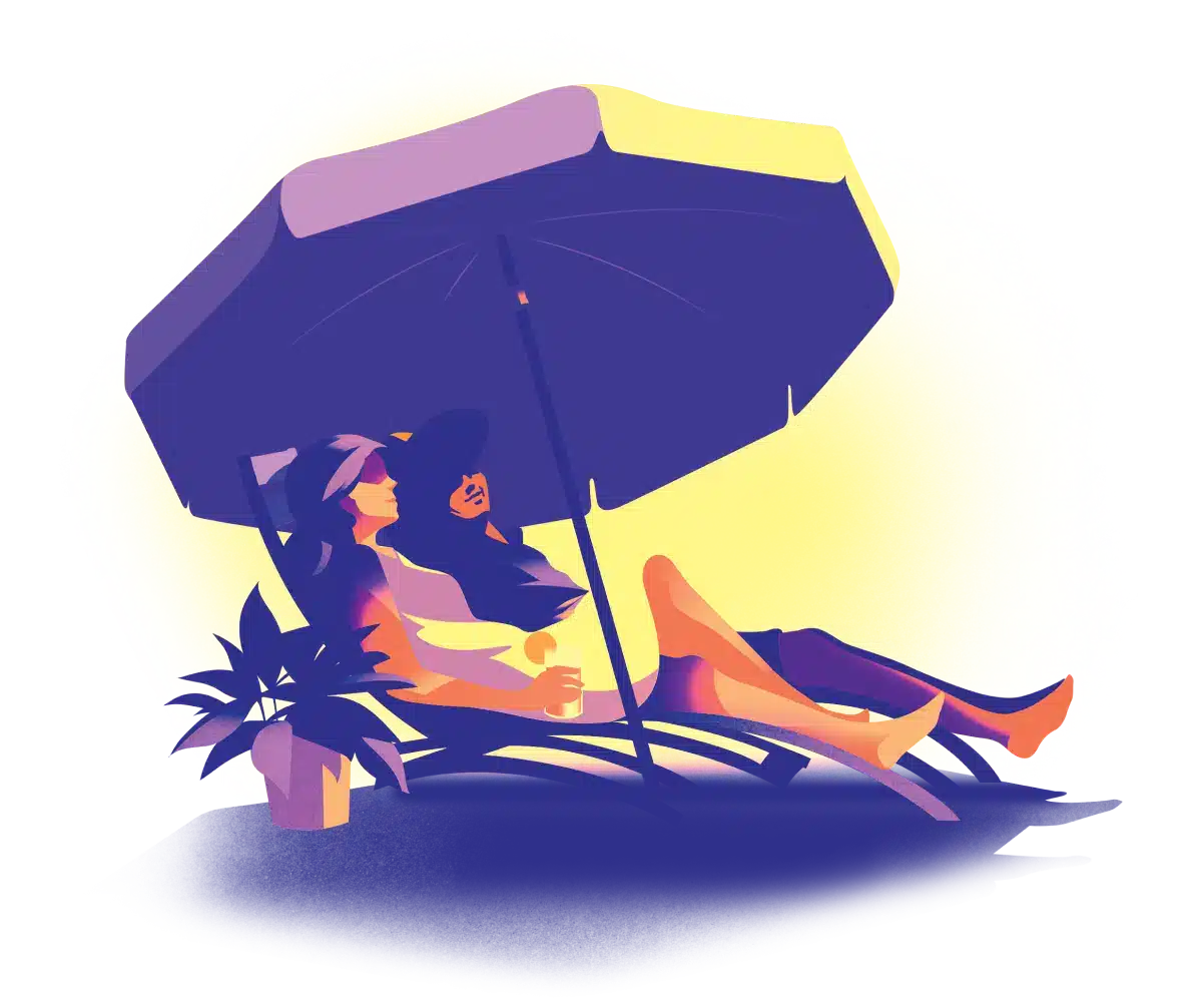 Two people sitting on the beach under an umbrella